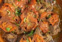 Rich Moroccan Beef Tagine with Tomatoes and Onions