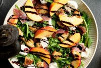 Decadent Peach Prosciutto Burrata Salad with Arugula and Crispy Croutons