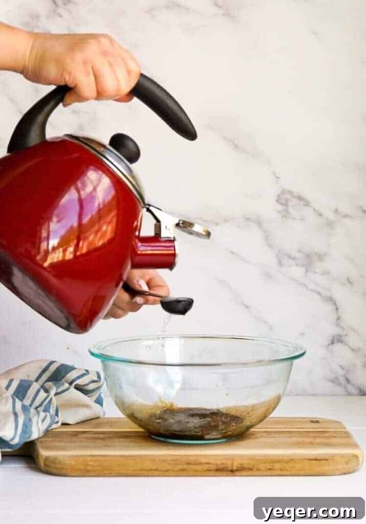 Velvet Dalgona Latte 6 Mixture being whisked in a bowl.