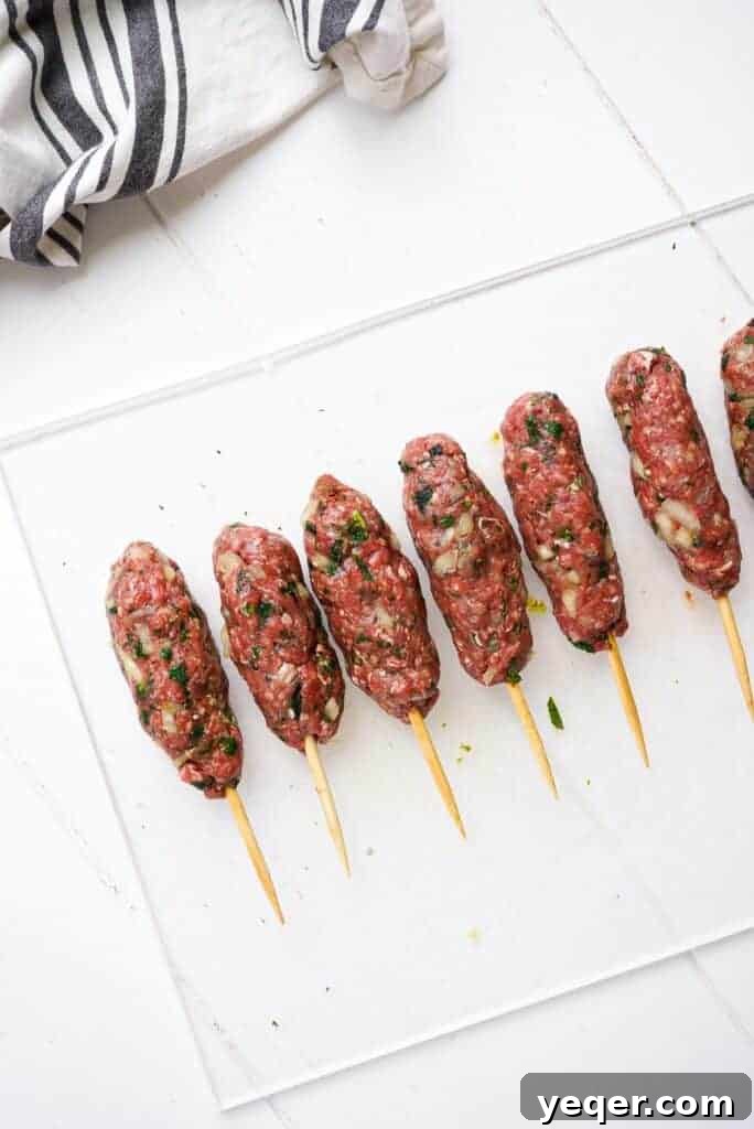 Moroccan Kefta Salad Bowl 6 6 Moroccan kefta burgers on a cutting board.