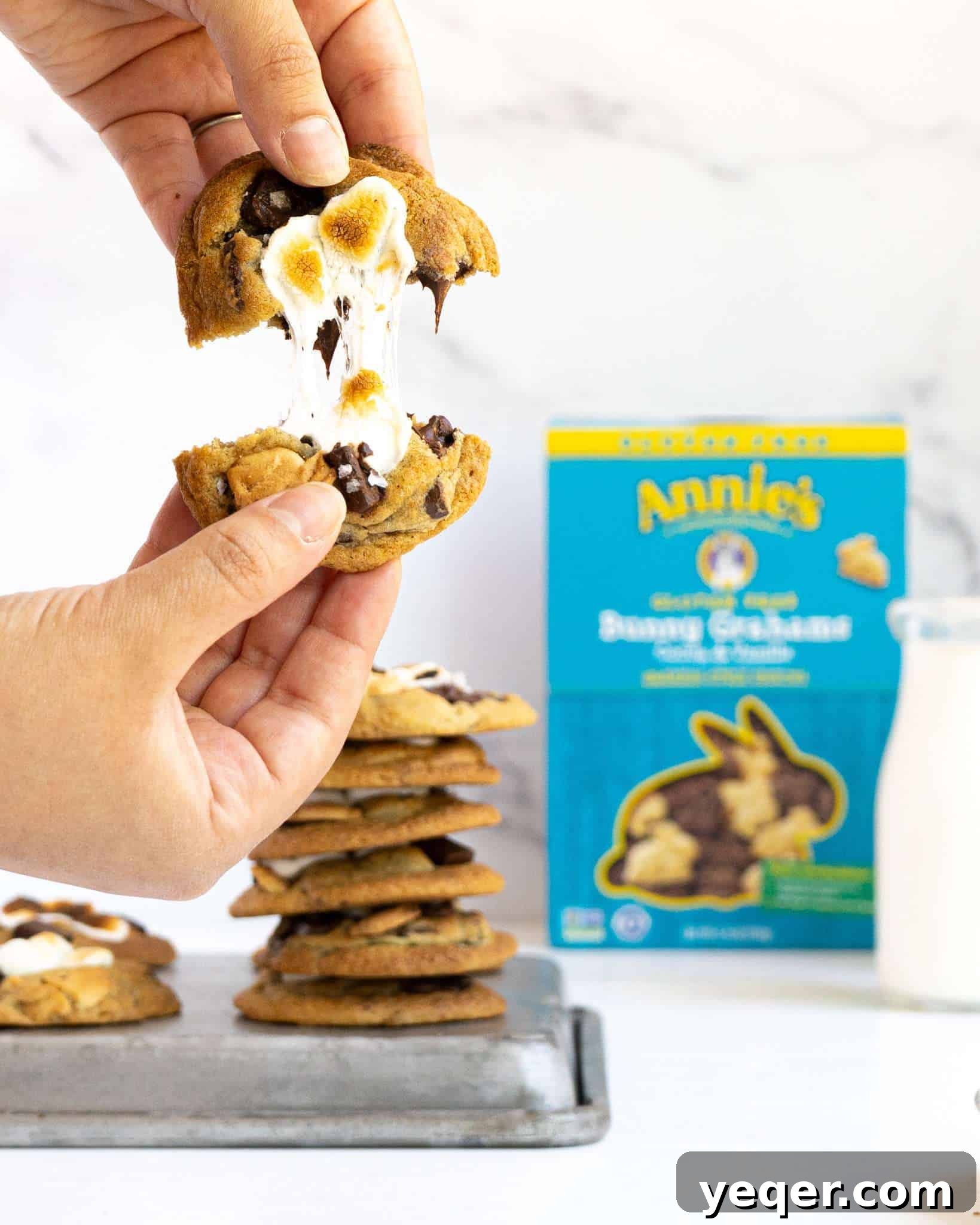 Gluten Free Smores Cookies with Annies and The Feed Feed 2 Two hands pulling apart a melty marshmallow s'mores cookie.