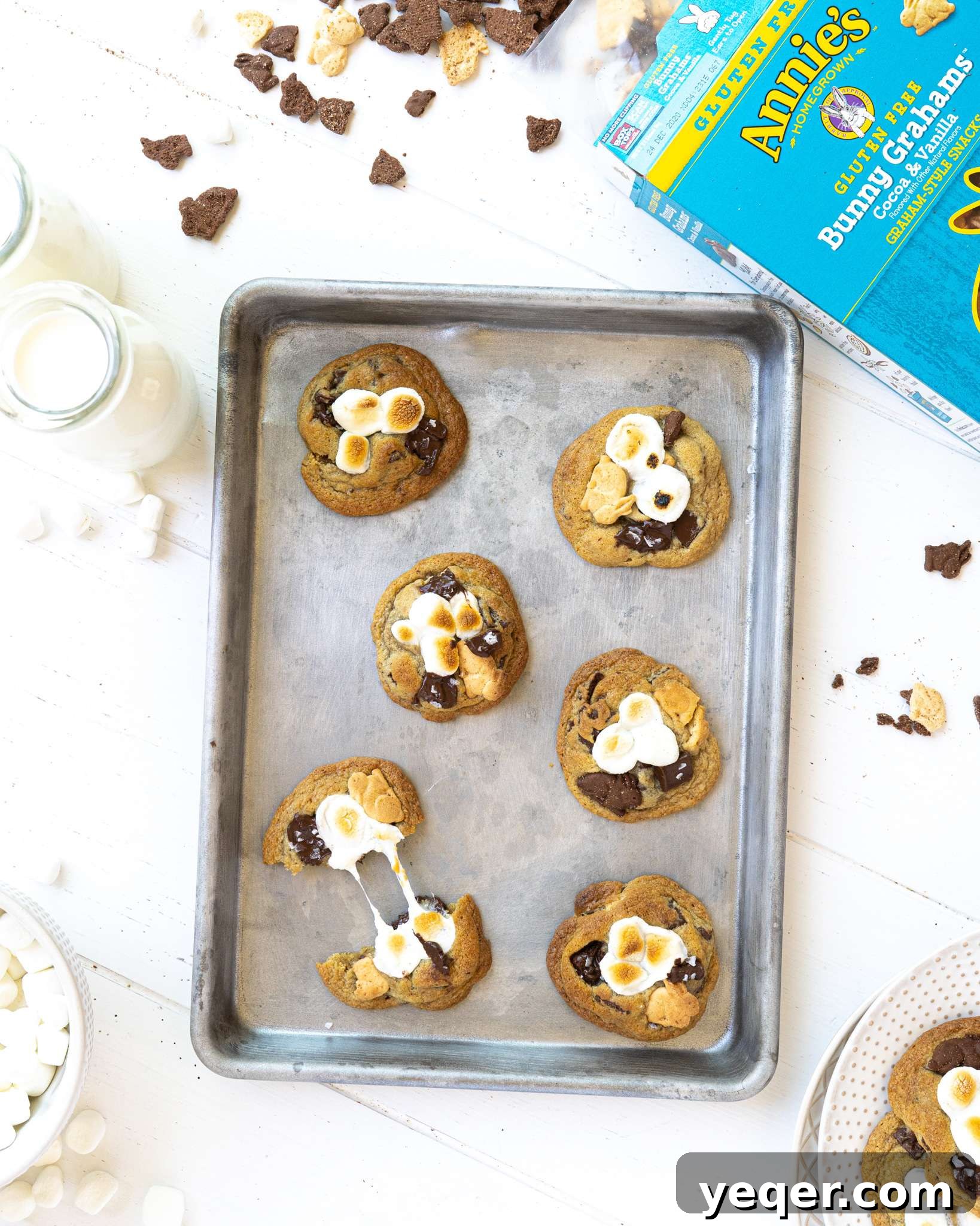 Gluten Free Smores Cookies with Annies and The Feed Feed 11 A gluten free s'mores cookie being pulled apart on a small baking sheet.
