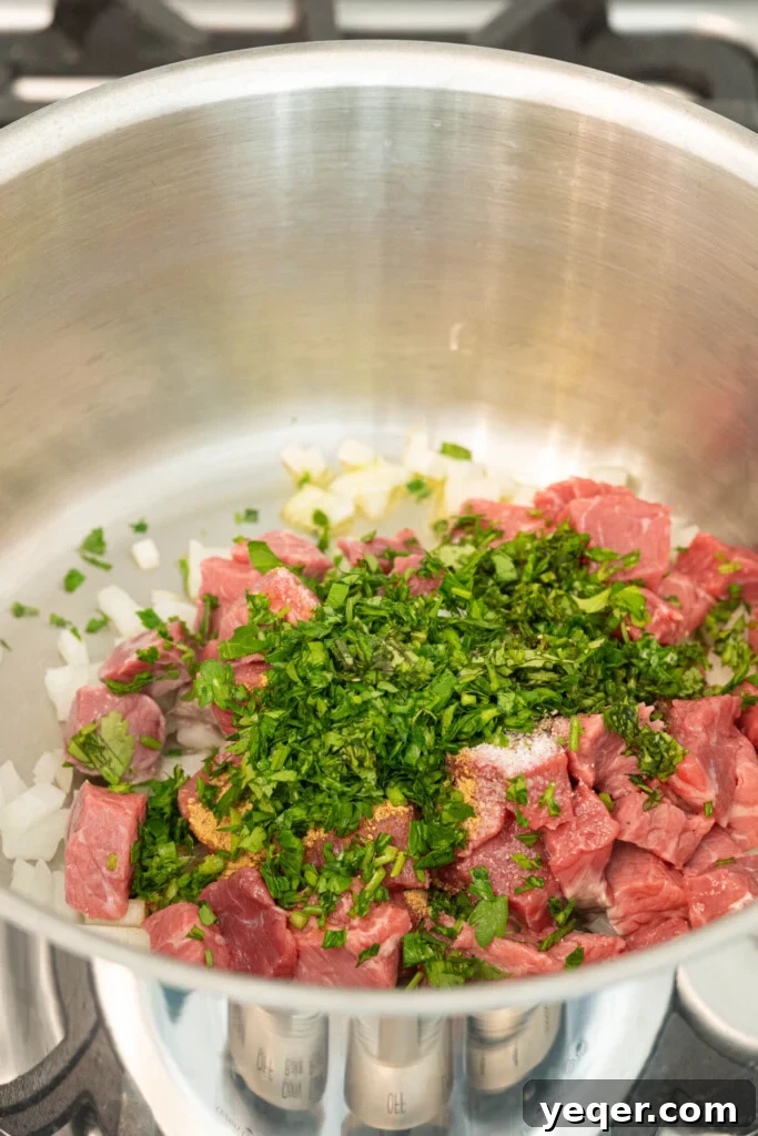 Moroccan Harira: A Spiced Lentil and Chickpea Comfort Soup 5 a pot of stew meat, herbs and onions