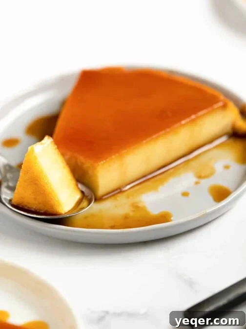 A plate of classic Puerto Rican flan with luscious caramel sauce