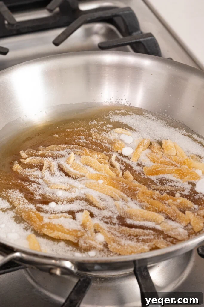 Silky Puerto Rican Caramel Flan 4 Granulated sugar melting slowly in a pan, beginning to liquefy and turn amber.