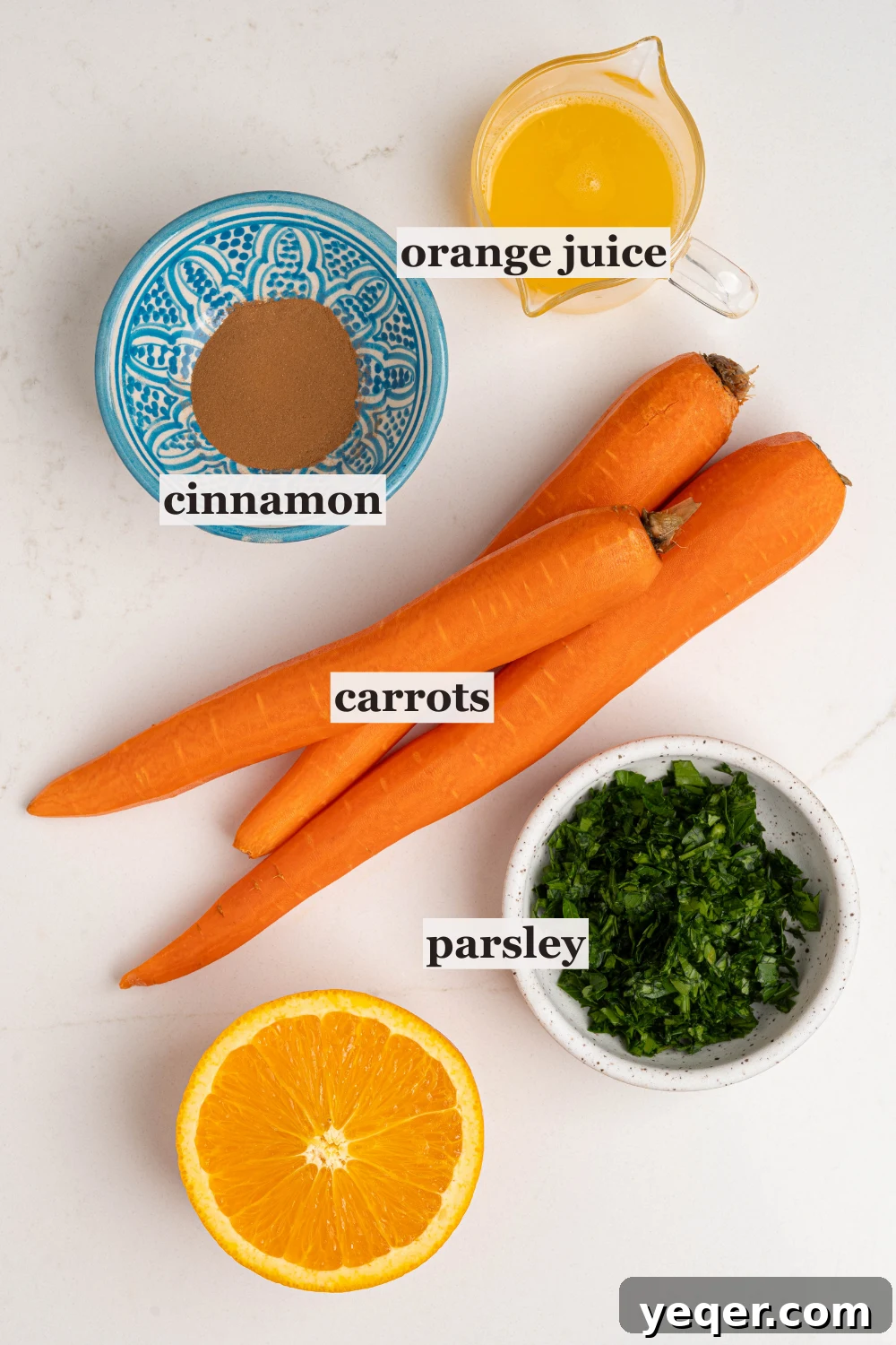 Zesty 10-Minute Moroccan Grated Carrot Salad 3 Bowls of cinnamon, parsley, and other ingredients for the carrot salad.