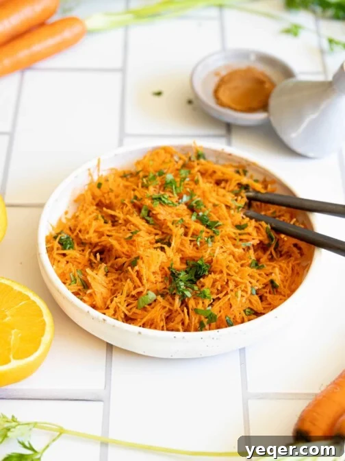 Zesty 10-Minute Moroccan Grated Carrot Salad 9 A bowl of Moroccan carrot salad.