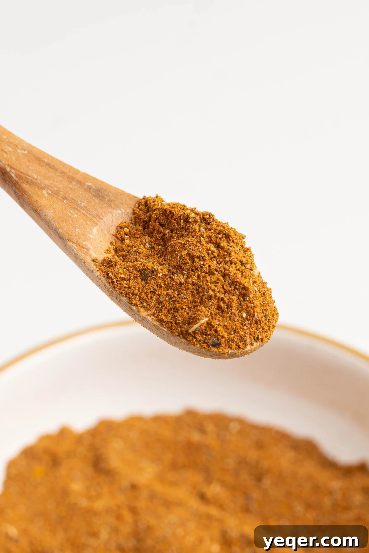 Homemade 5-Minute Ras El Hanout Spice Mix 7 Ras el hanout on a spoon.