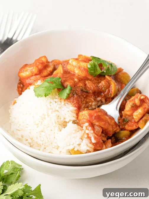 Savory Simmered Shrimp 9 A bowl of Camarones Guisados, a traditional Puerto Rican stewed shrimp dish.