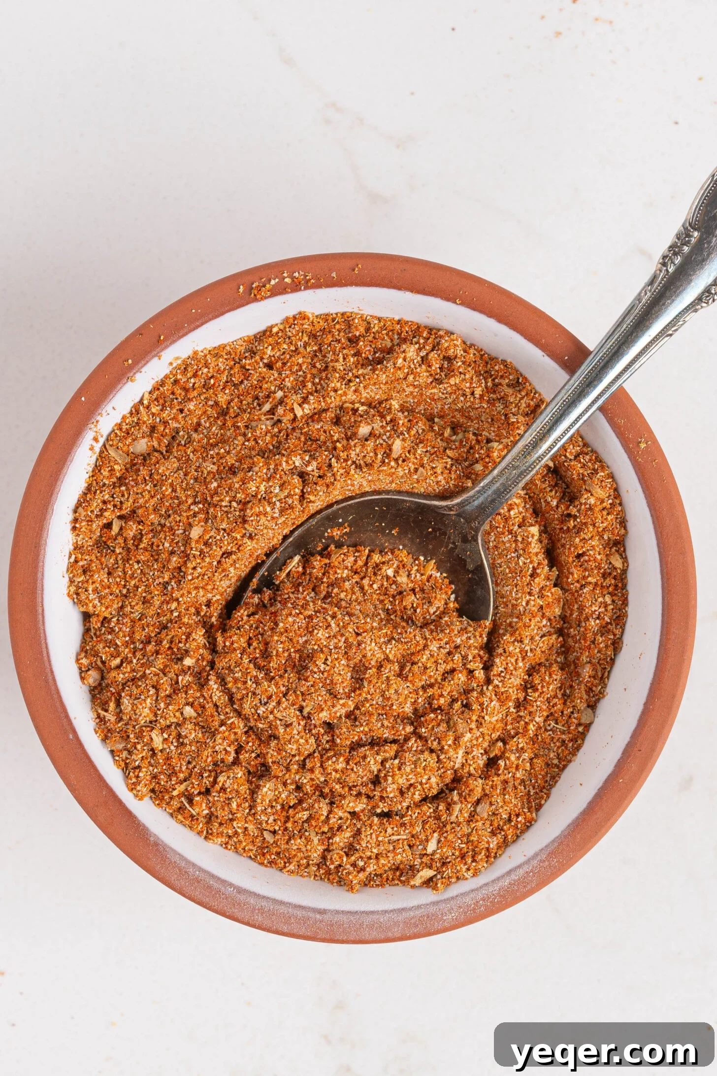 A bowl of sazon seasoning.