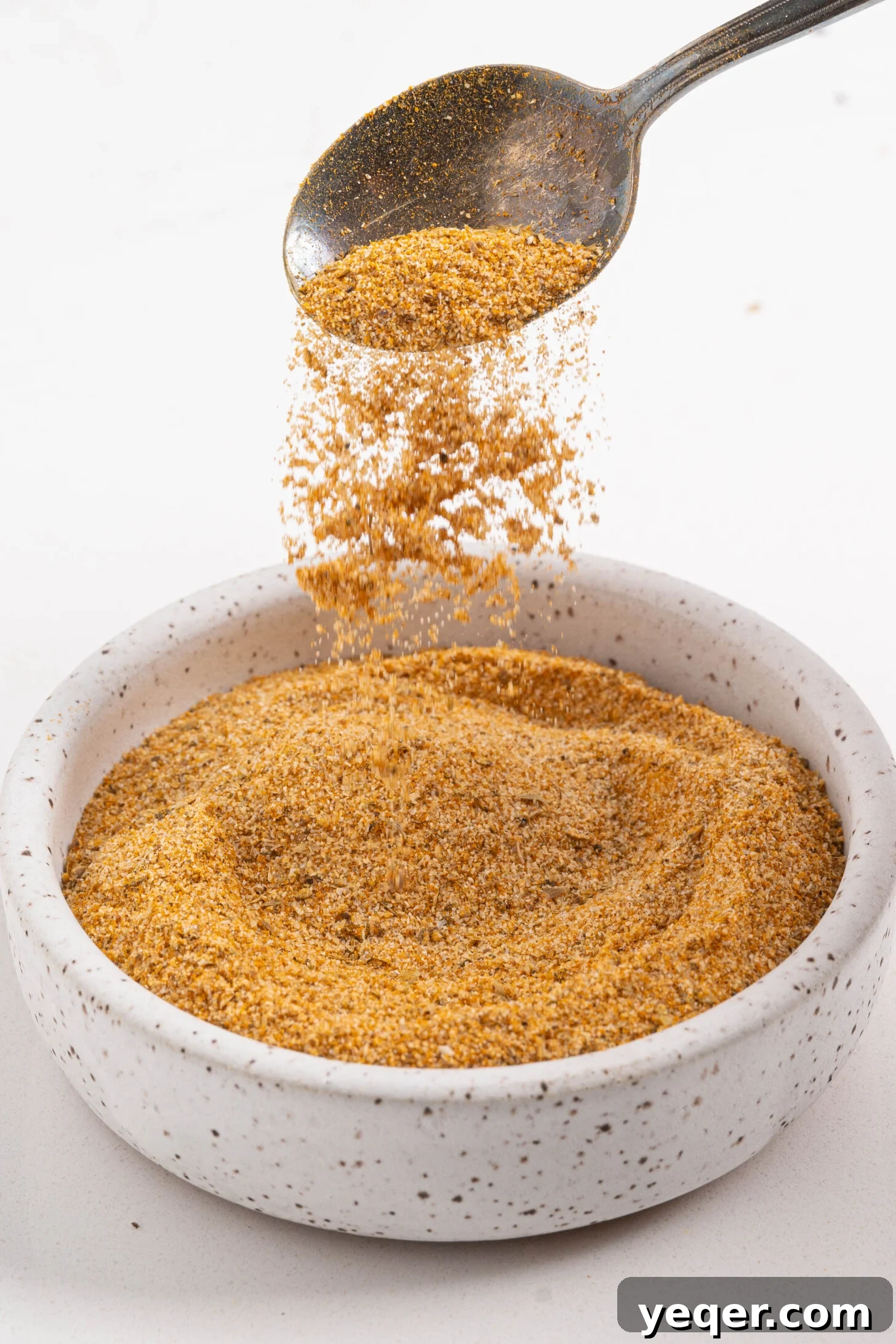 Your 5-Minute Homemade Adobo Spice Secret 3 A vibrant bowl of adobo seasoning, ready to infuse flavor into any dish.