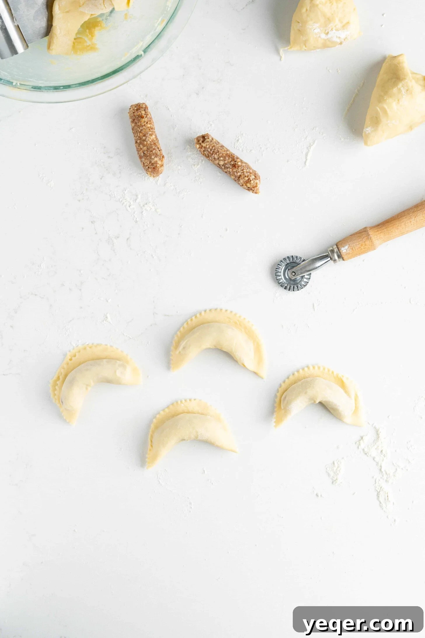 Moroccan Gazelle Horn Almond Crescents 7 gazelle horn cookies being cut