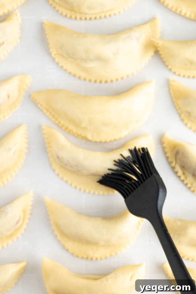 Moroccan Gazelle Horn Almond Crescents 8 orange blossom water brushing over cookies