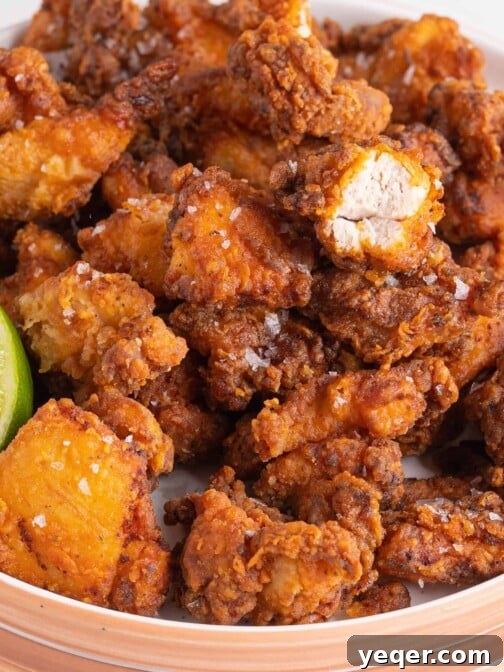 A plate of crispy Puerto Rican fried chicken