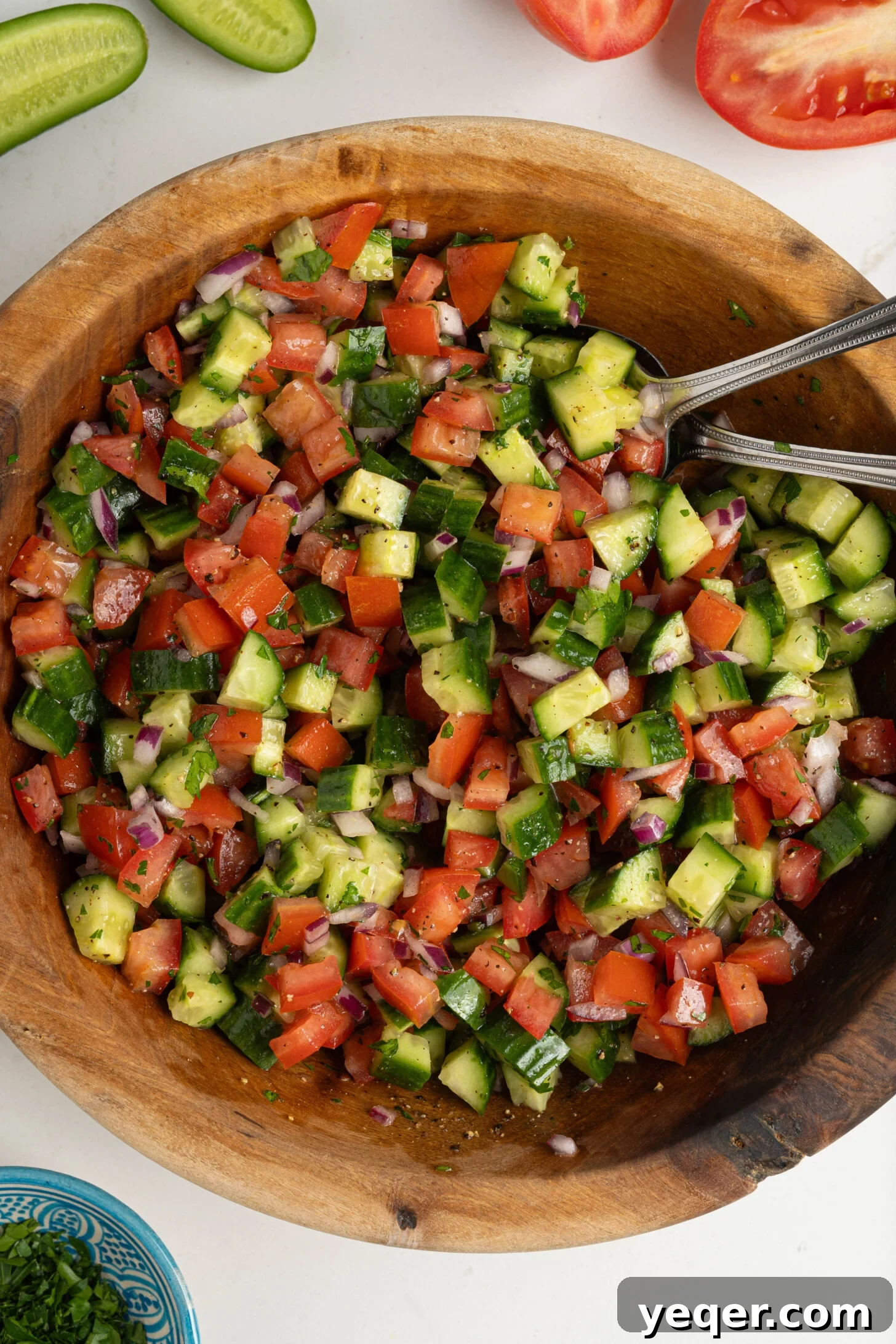 Vibrant Moroccan Cucumber Tomato Salad 6 A large serving bowl brimming with authentic Moroccan cucumber tomato salad, ready to be enjoyed.