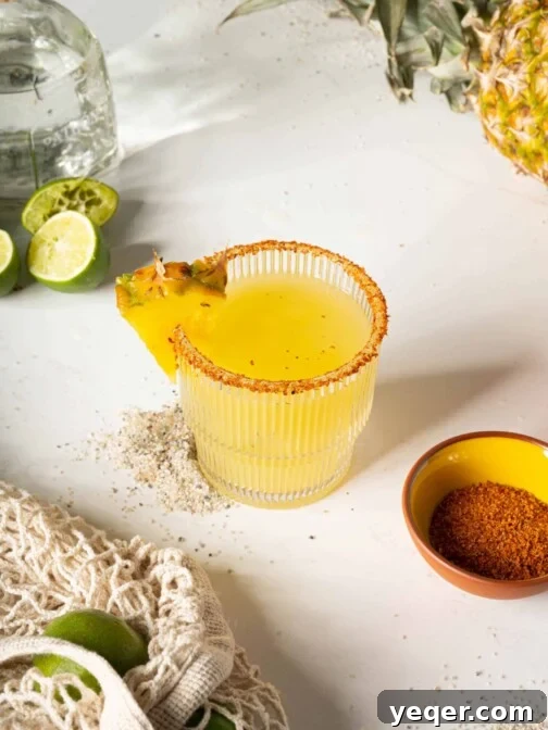 A pineapple margarita in a glass