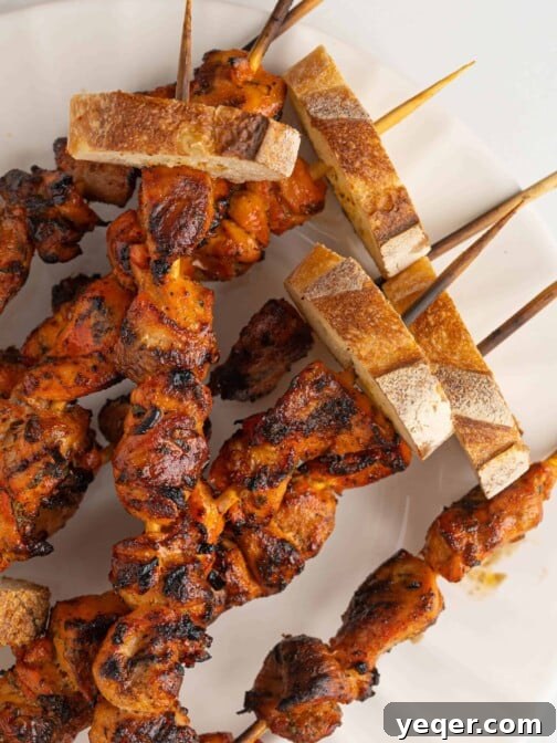 a plate of pinchos de pollo