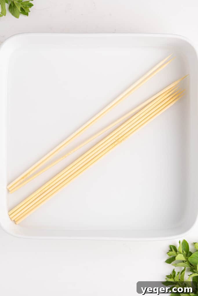 Zesty Grilled Puerto Rican Chicken Skewers 4 skewers soaking in water