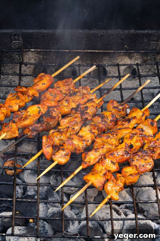 Zesty Grilled Puerto Rican Chicken Skewers 6 pinchos de pollo on the grill