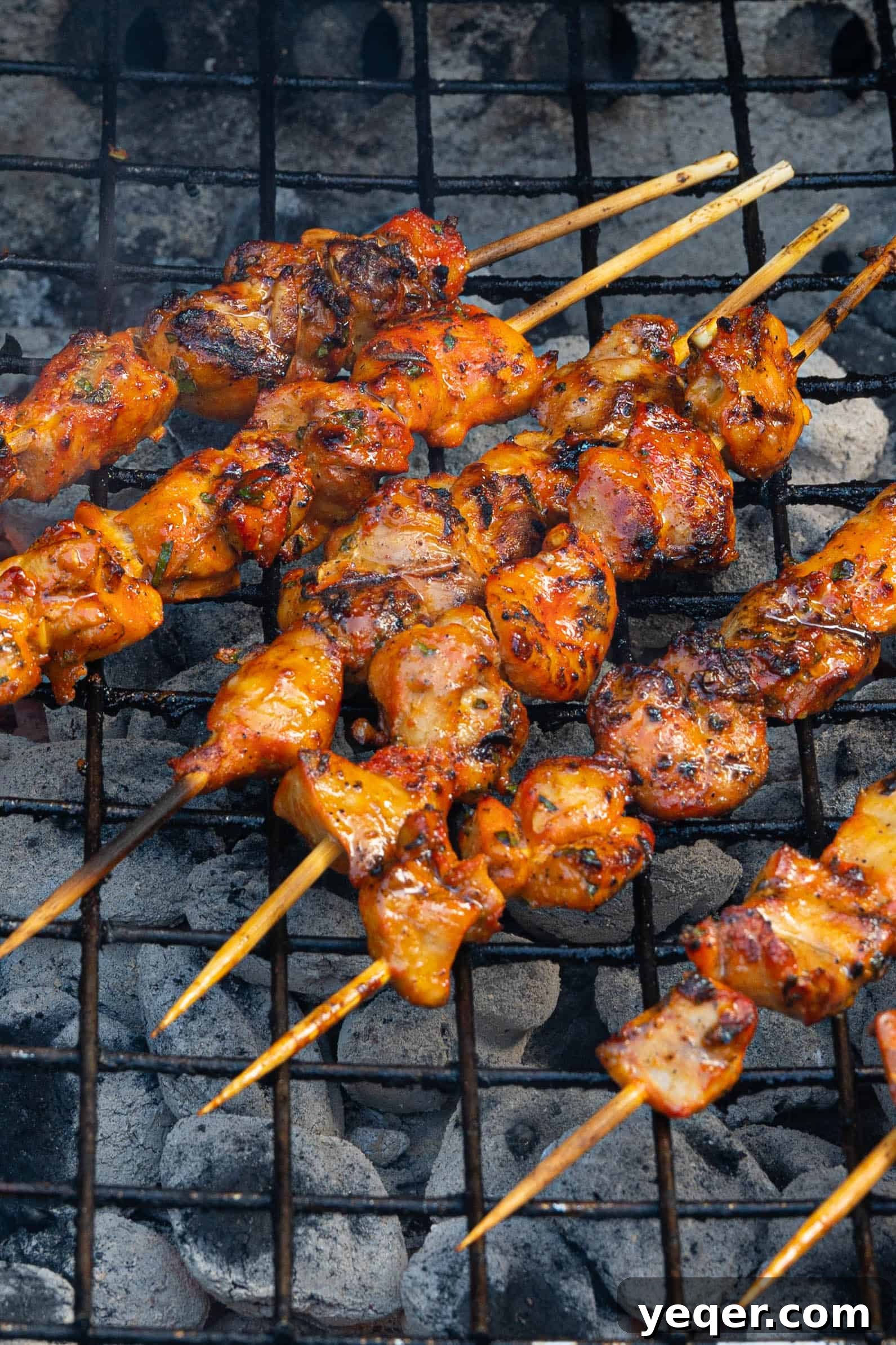 Zesty Grilled Puerto Rican Chicken Skewers 8 pinchos de pollo on the grill