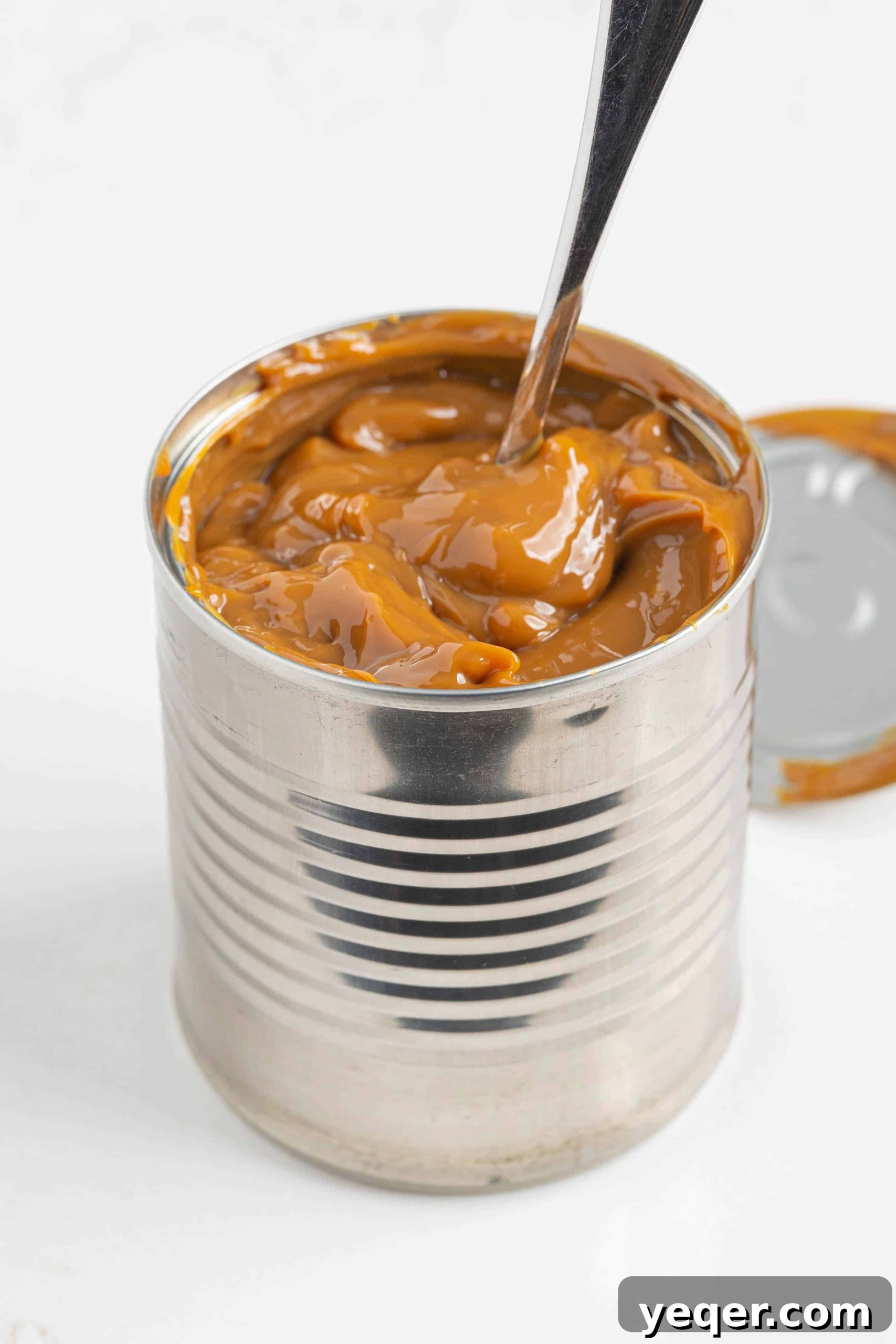 One Ingredient Wonder: Homemade Dulce de Leche Caramel Sauce 8 An open can revealing the freshly made dulce de leche inside, still in its original container.