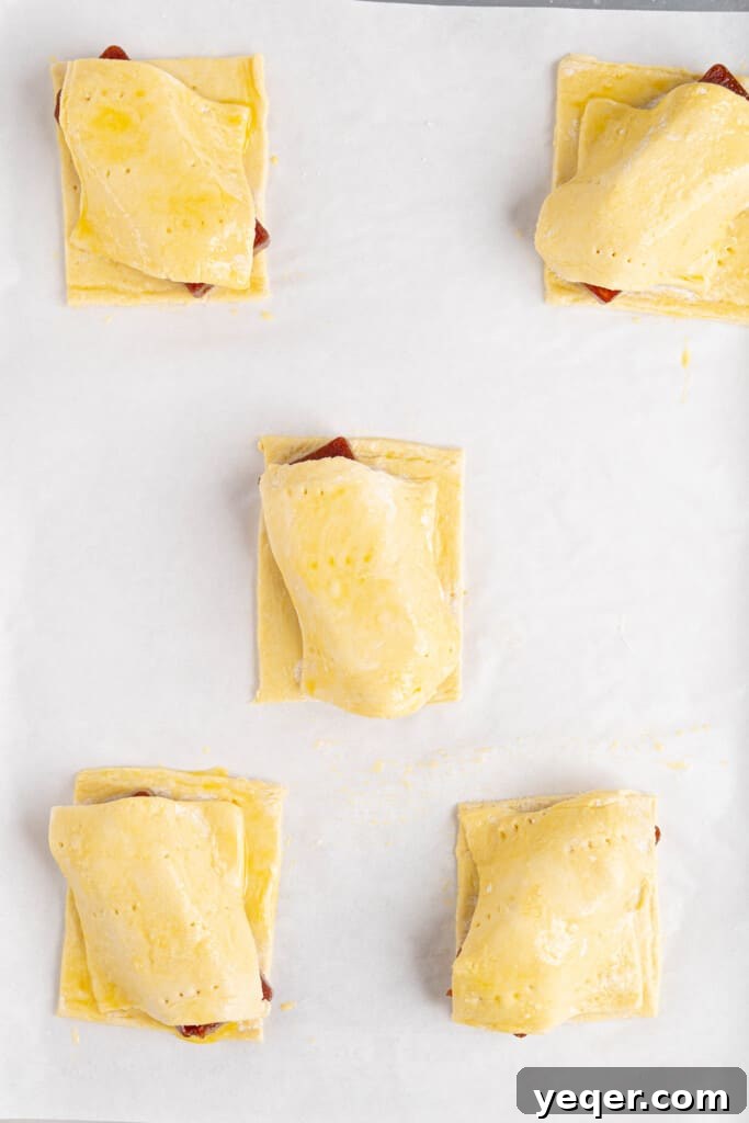 Tropical Guava Treats 7 guava pastelillos on a baking sheet