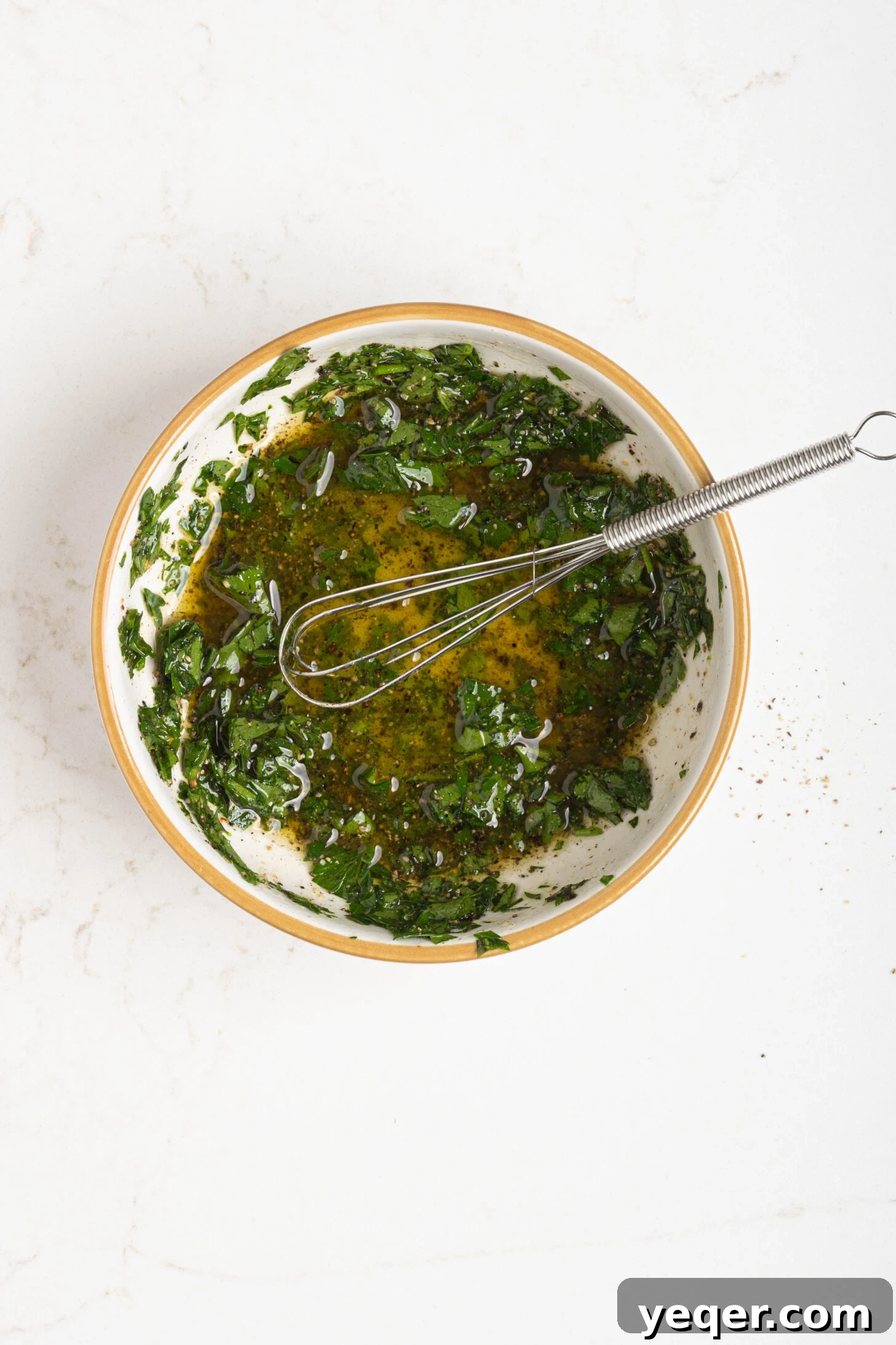 Chilled Moroccan Roasted Beet Salad 5 A small bowl containing the freshly prepared parsley vinaigrette dressing.