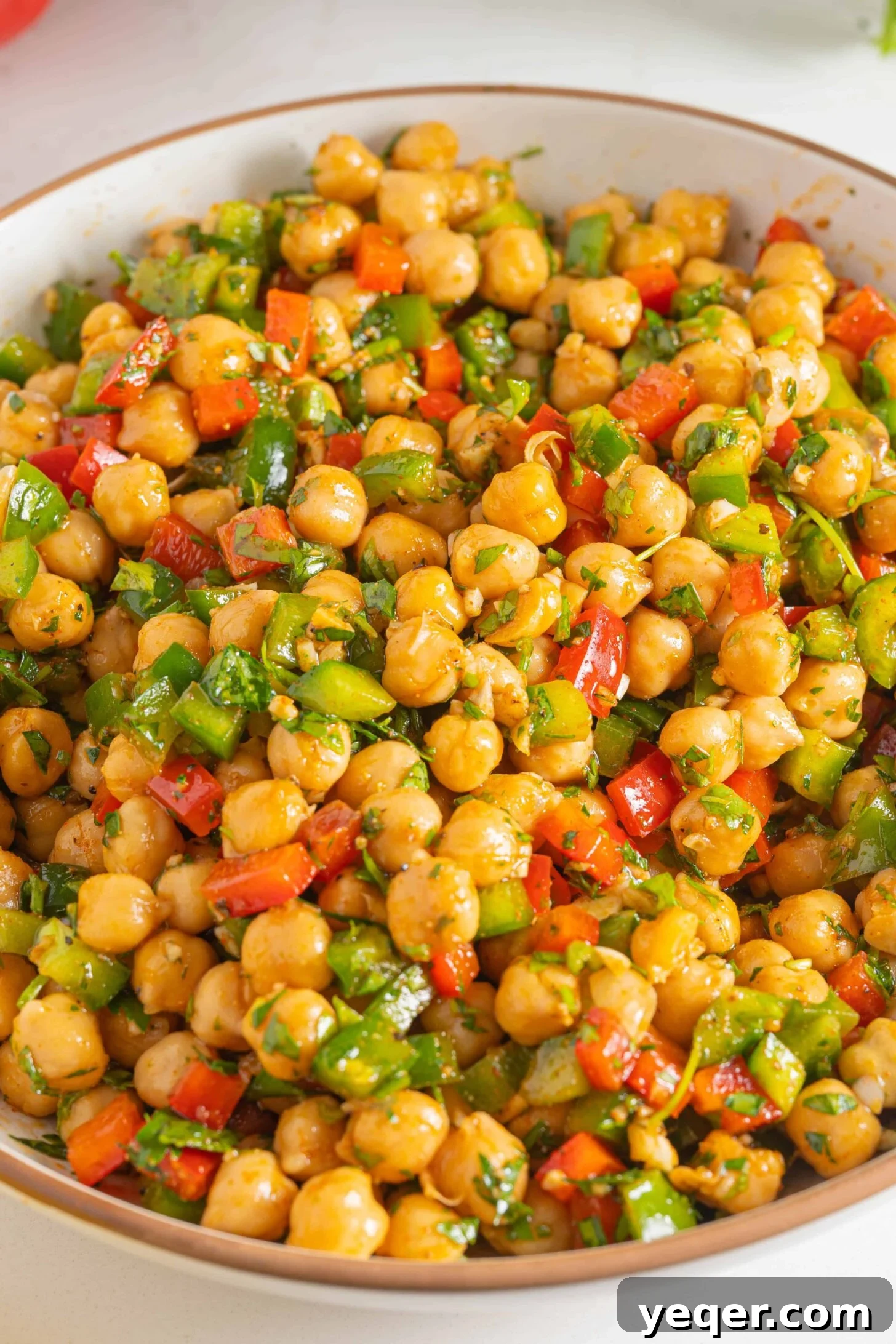 Vibrant 15-Minute Moroccan Chickpea Salad 9 A close-up shot of the spiced chickpea salad, showcasing its fresh and colorful ingredients.