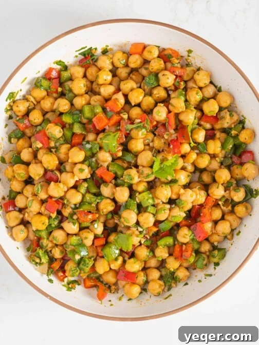 Vibrant 15-Minute Moroccan Chickpea Salad 11 A large bowl of 15-Minute Moroccan-Spiced Chickpea Salad, vibrant and ready to serve.