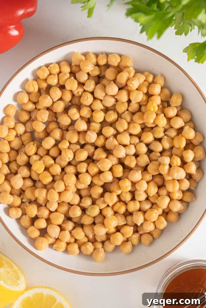 Vibrant 15-Minute Moroccan Chickpea Salad 5 Drained chickpeas in a bowl, ready to be mixed with the dressing and vegetables.