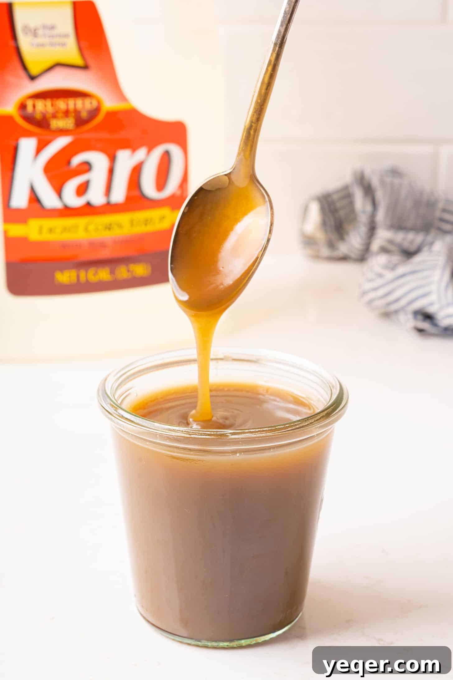 Velvety Vegan Coconut Caramel in 30 Minutes 9 Close-up view of the smooth, golden vegan coconut caramel sauce in a glass jar, perfectly made.