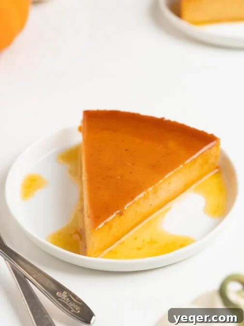 Sliced pumpkin flan on a white plate, ready to be served.