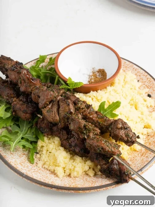 A plate of grilled lamb kebabs