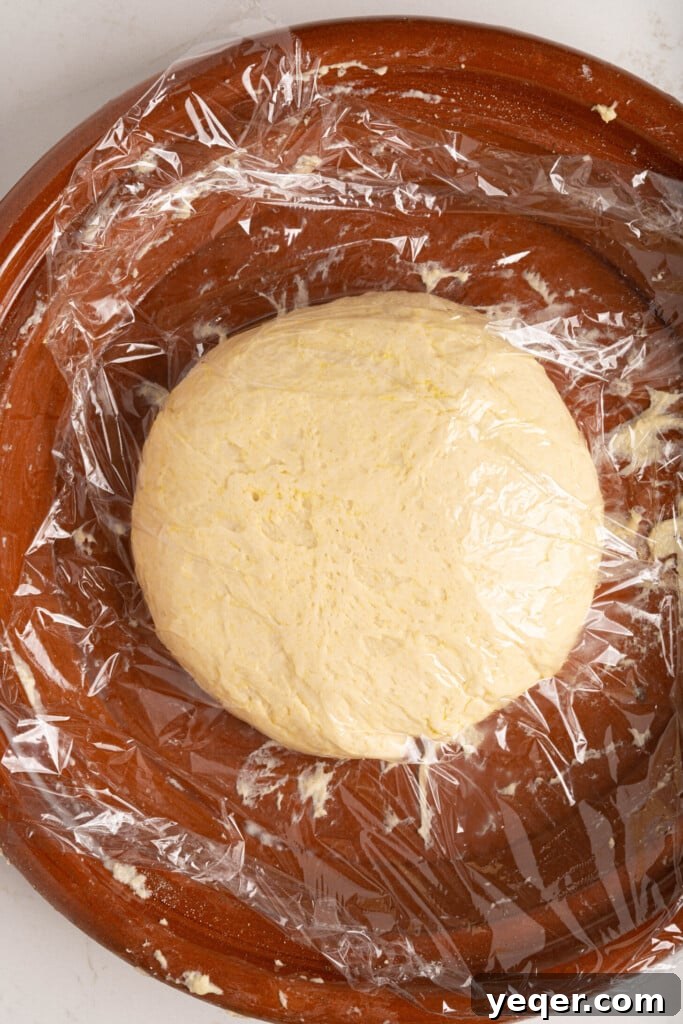 Pillowy Soft Moroccan Khobz Bread Recipe 4 Moroccan bread dough on a pot