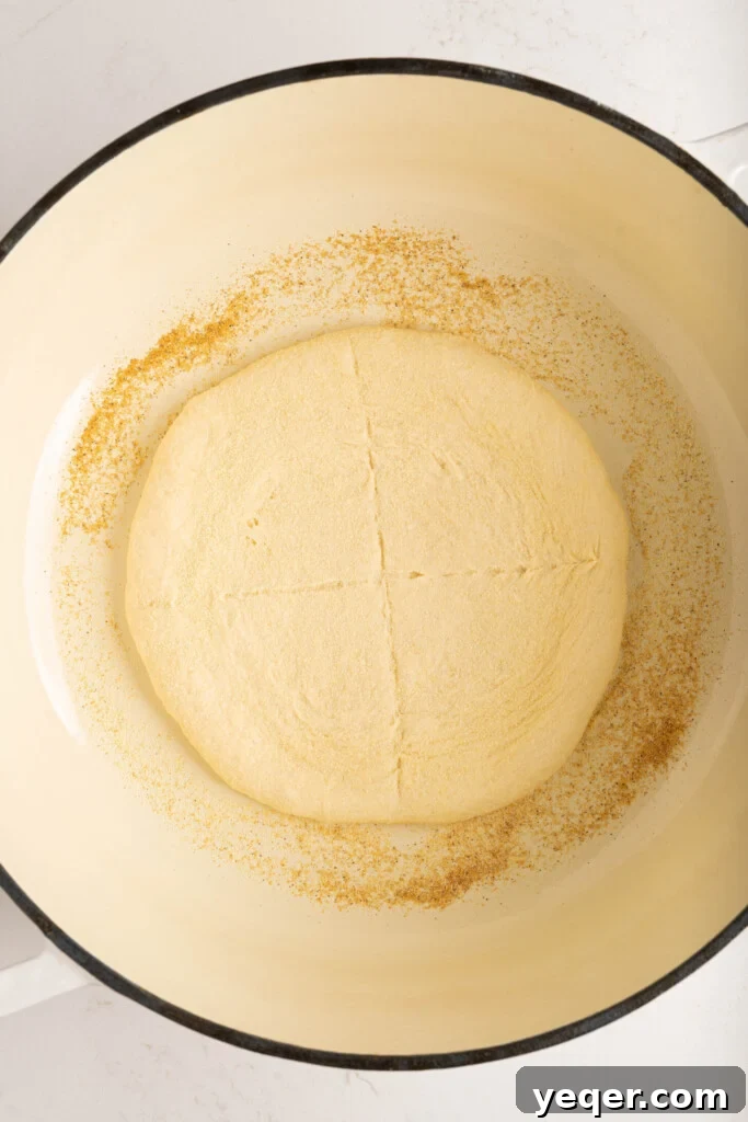 Pillowy Soft Moroccan Khobz Bread Recipe 8 Moroccan bread dough in a pot