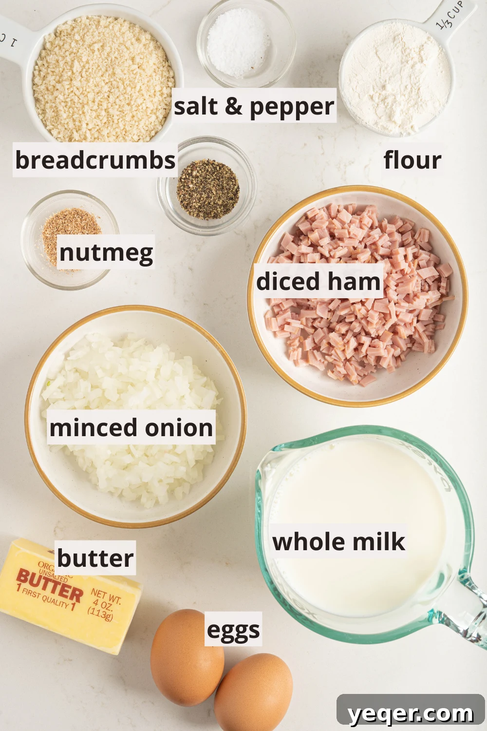 Golden Ham Croquettes 4 Bowls of meticulously diced ham, finely minced onion, fresh whole milk, crisp breadcrumbs, and other essential ingredients laid out for making croquetas.