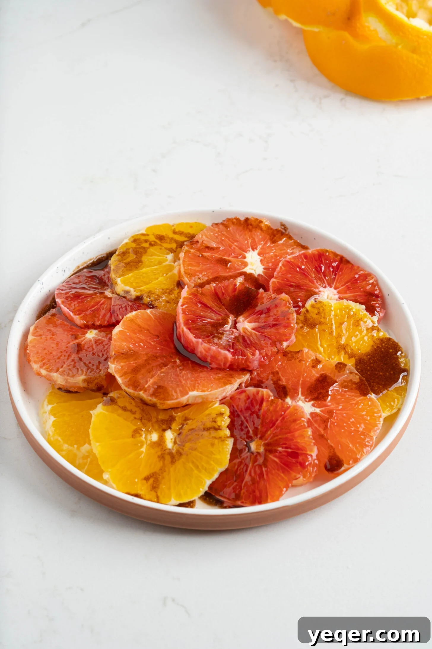 Quick Moroccan Orange Salad with Cinnamon Spice 10 A close-up shot of the finished Moroccan orange salad, perfectly arranged and drizzled with dressing.