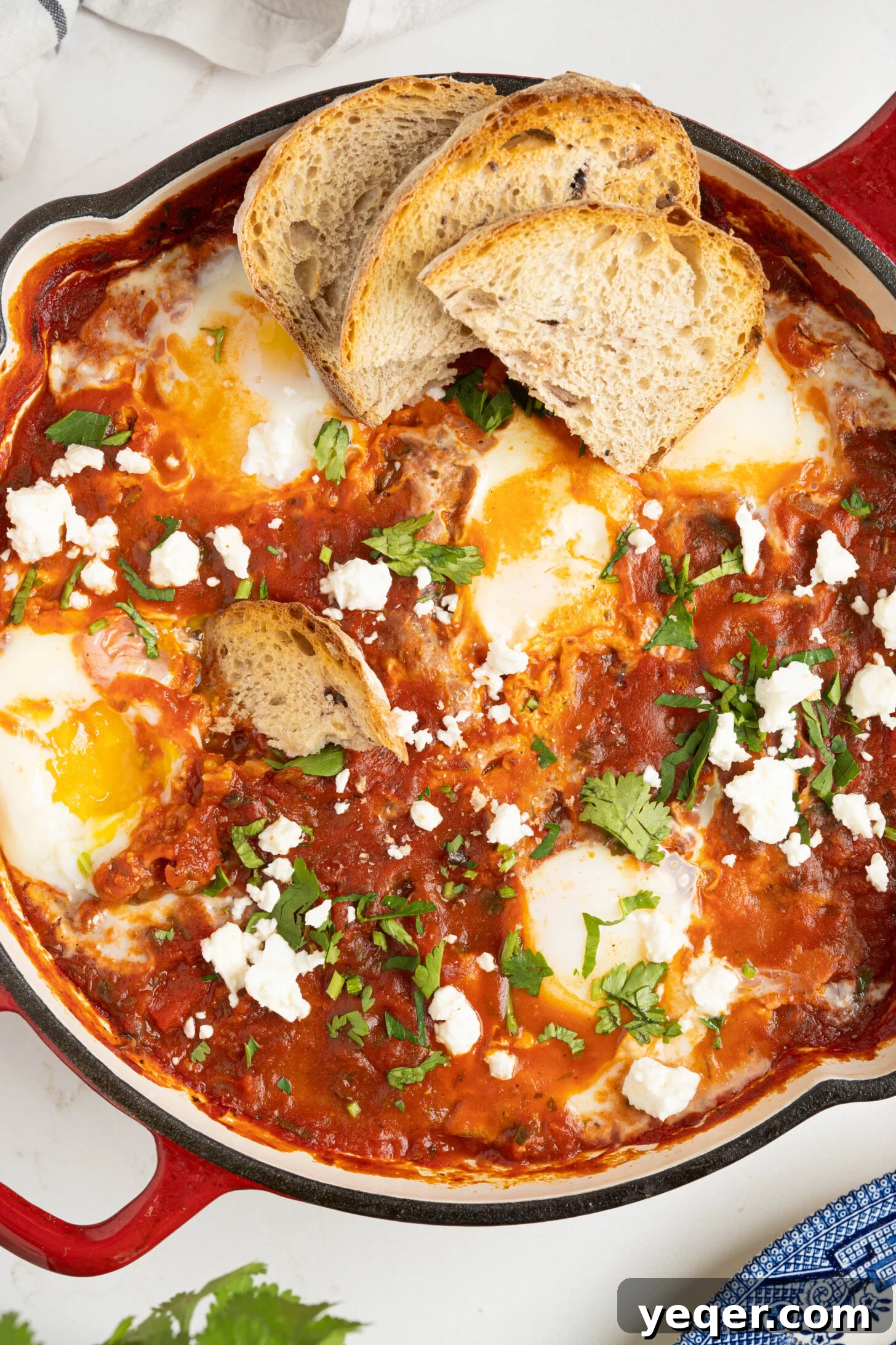 Speedy Moroccan Shakshuka 2 shakshuka in a pan on a white counter