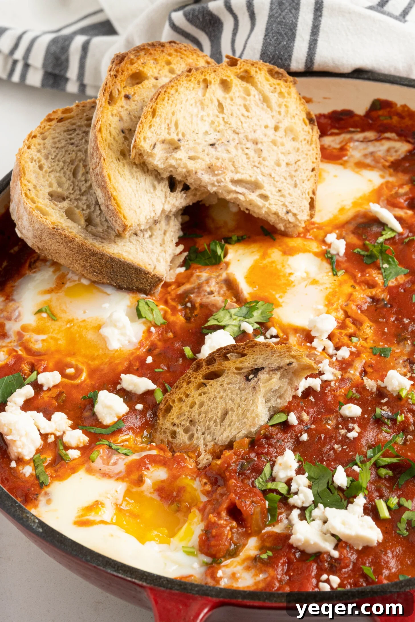 Speedy Moroccan Shakshuka 10 shakshuka in a pan with bread