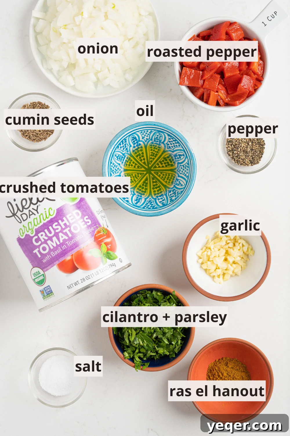 Speedy Moroccan Shakshuka 3 bowls of oil, peppers, spices, and more on a white counter