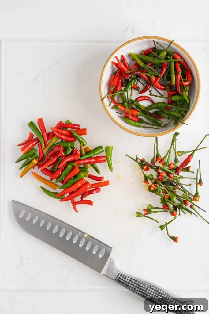 Boricua Flash Pique 5 chile peppers on a cutting board