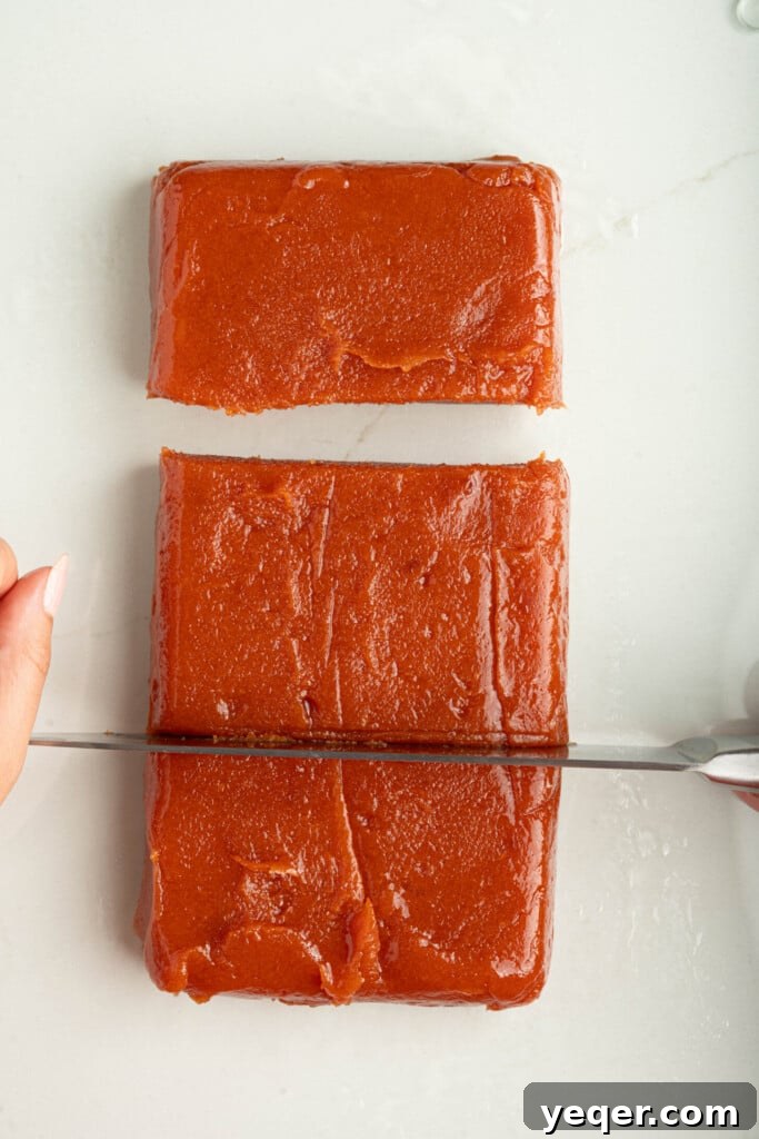 Four Ingredient Guava Paste Made Easy 11 chunks of guava paste on a cutting board