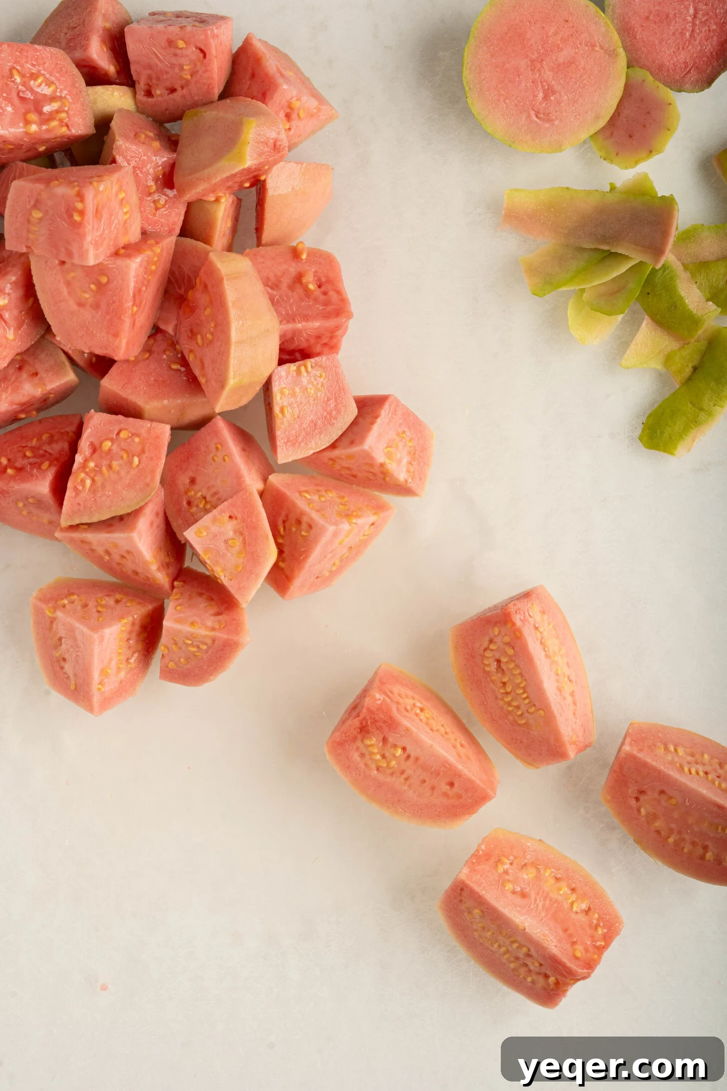 Four Ingredient Guava Paste Made Easy 13 chopped guavas on a cutting board
