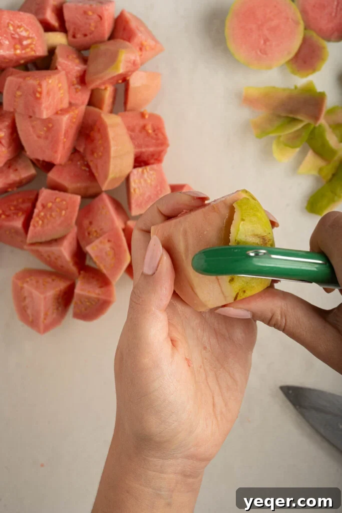Four Ingredient Guava Paste Made Easy 4 hands peeling a guava