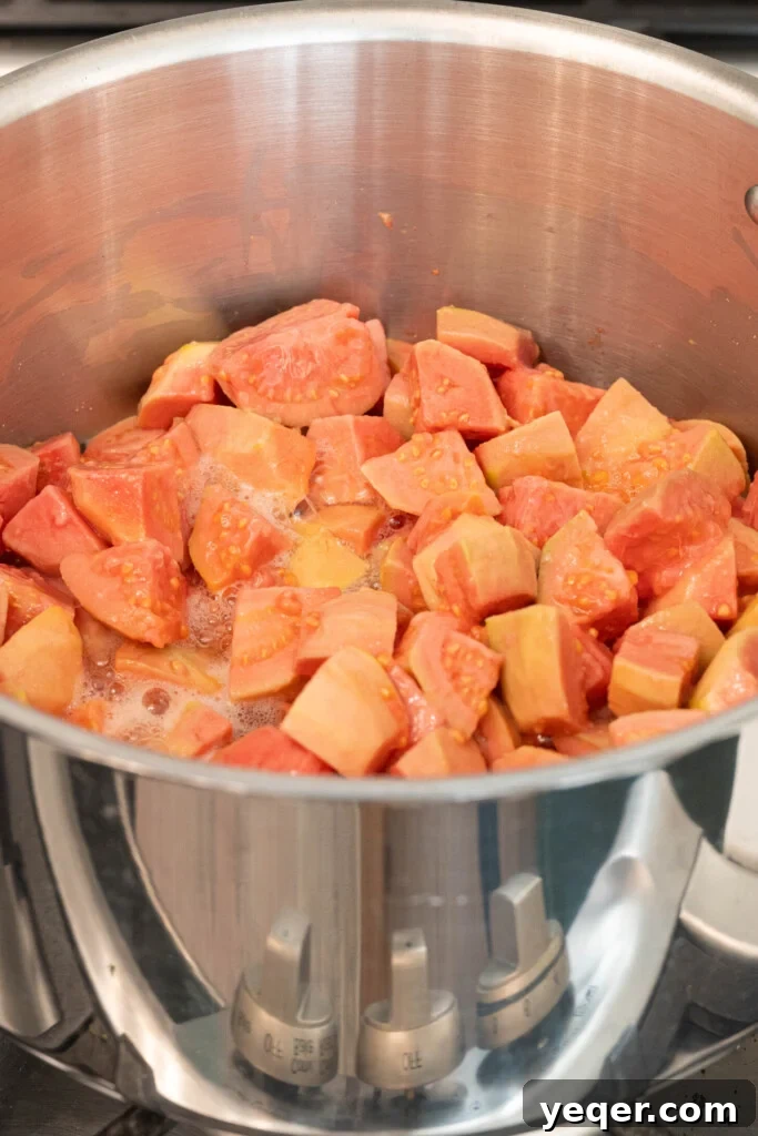 Four Ingredient Guava Paste Made Easy 5 chopped guavas in a pot