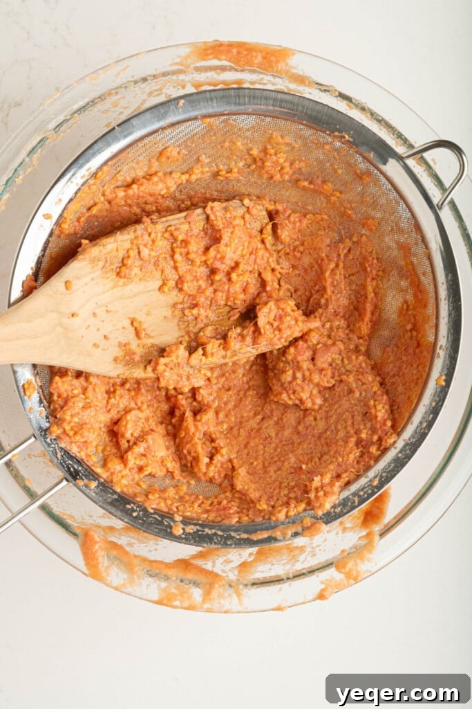 Four Ingredient Guava Paste Made Easy 6 guava paste in a strainer