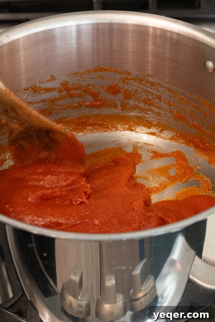 Four Ingredient Guava Paste Made Easy 9 guava paste in a pot