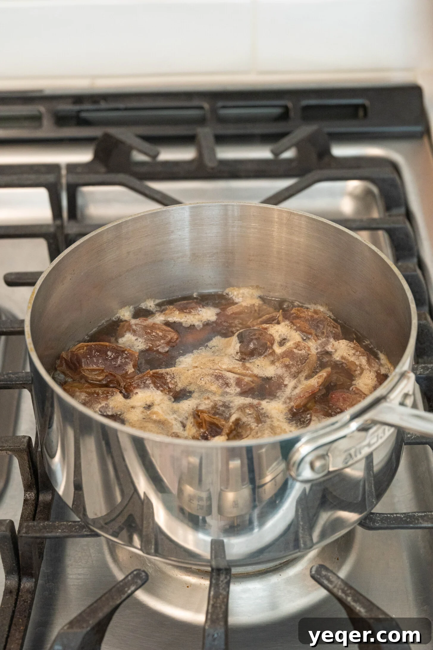 Pure Date Nectar 7 Pitted dates and steeping water transferred to a saucepan for boiling
