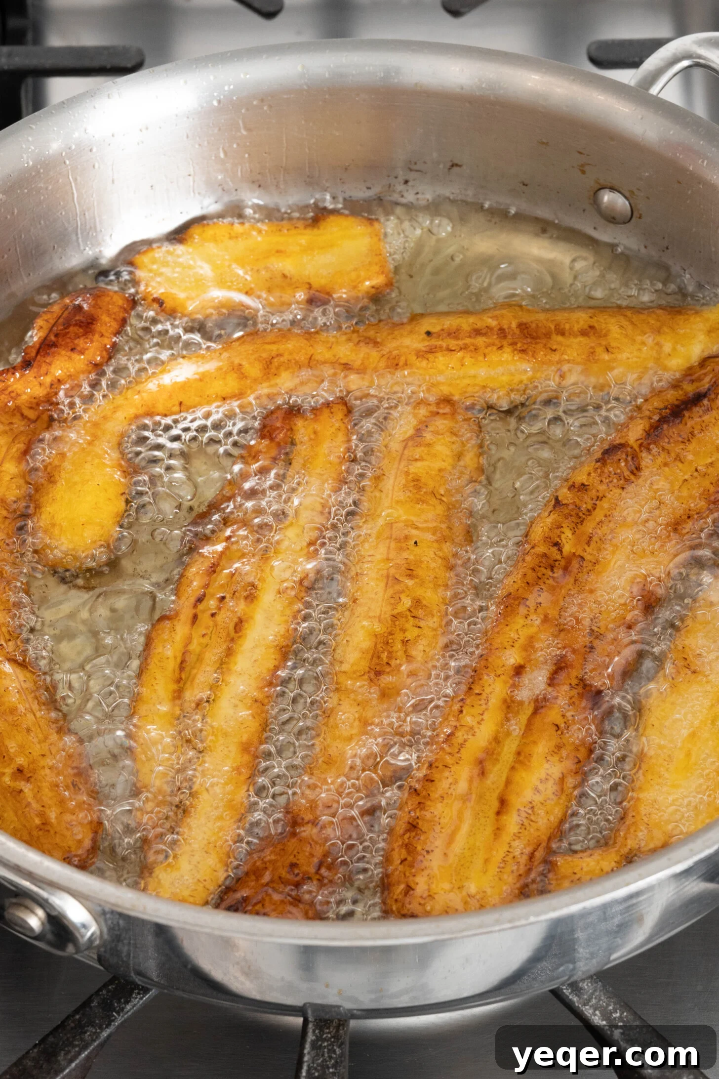 Caramelized Plantain Lasagna 6 brown plantains frying in oil