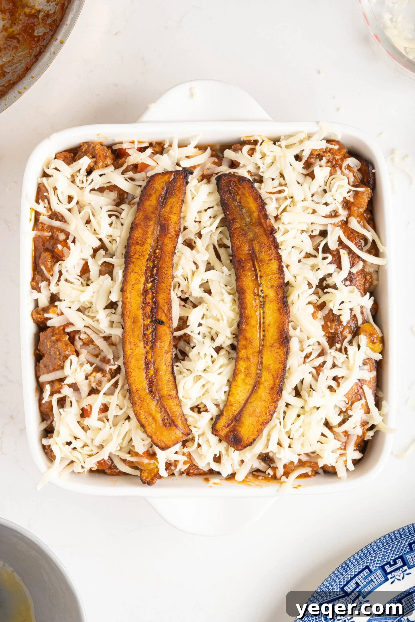 Caramelized Plantain Lasagna 7 a dish of pastelón before being baked